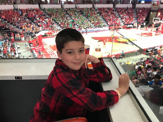A student watches an Illinois State University basketball game.